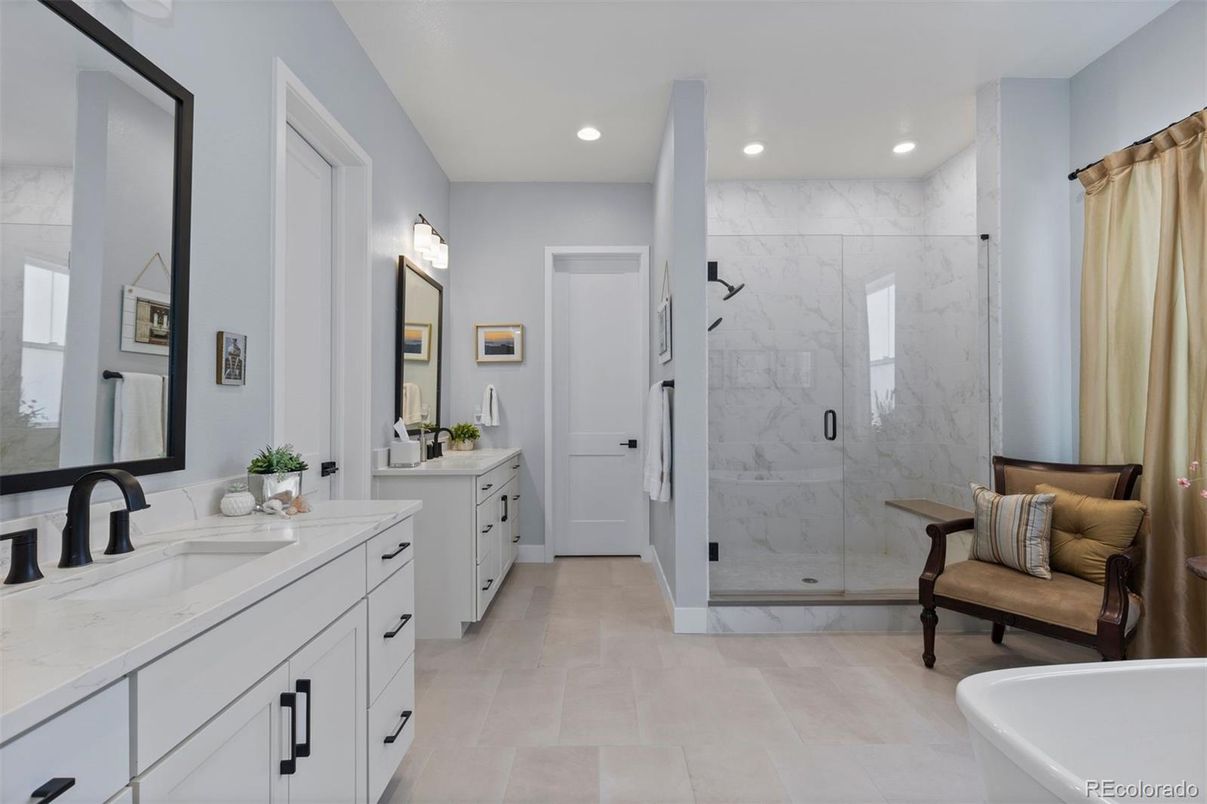 Bathroom, Dual Sink Vanities, Glass Shower, Interior, Marble Walls, Recessed Lighting