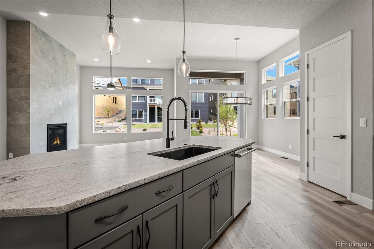 Fireplace, Interior, Kitchen, Pendant Lights, Recessed Lighting, Wood Texture Flooring