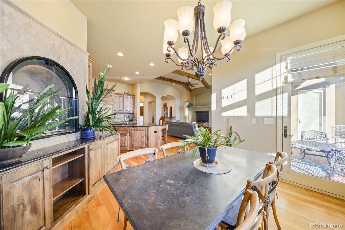 Chandelier, Dining room, Fireplace, Interior, Recessed Lighting, Wood Texture Flooring