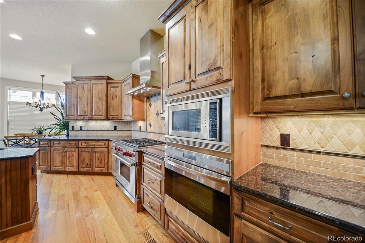 Chandelier, Interior, Kitchen, Recessed Lighting, Stainless Steel Appliances, Wood Texture Flooring