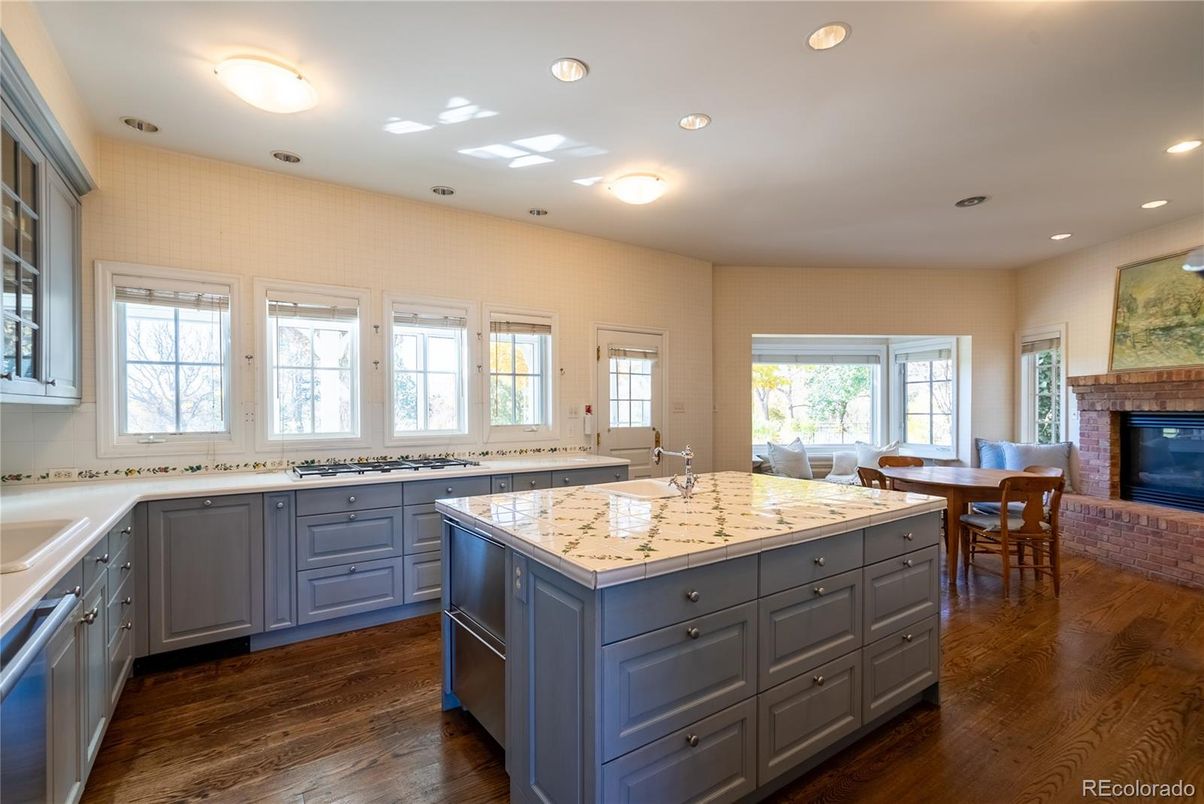 Dining room, Fireplace, Interior, Kitchen, Recessed Lighting, Wood Texture Flooring
