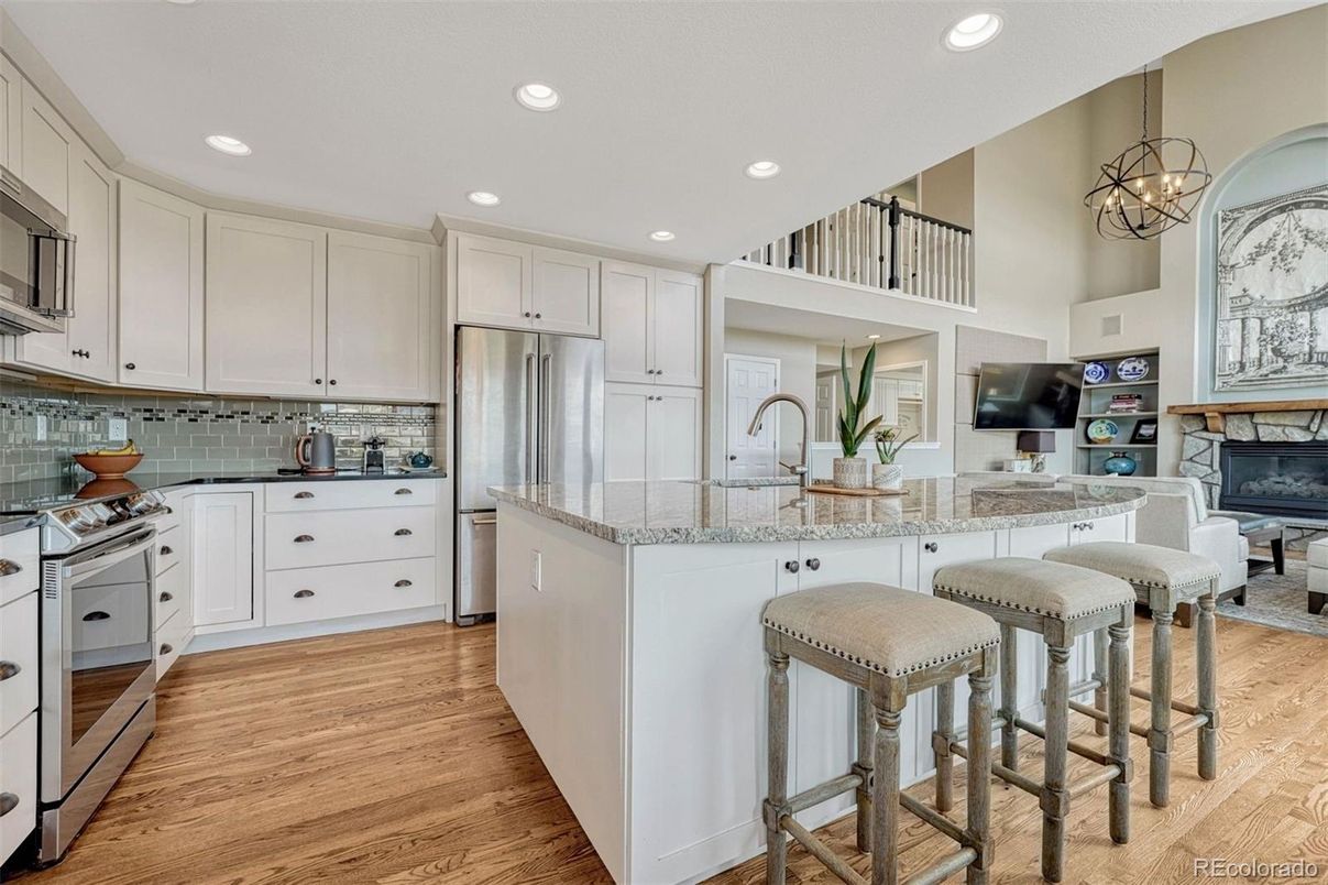 Fireplace, Interior, Kitchen, Pendant Lights, Recessed Lighting, Stainless Steel Appliances, Wood Texture Flooring