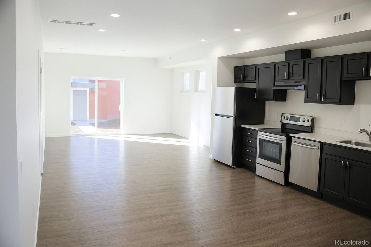 Interior, Kitchen, Recessed Lighting, Stainless Steel Appliances, Wood Texture Flooring