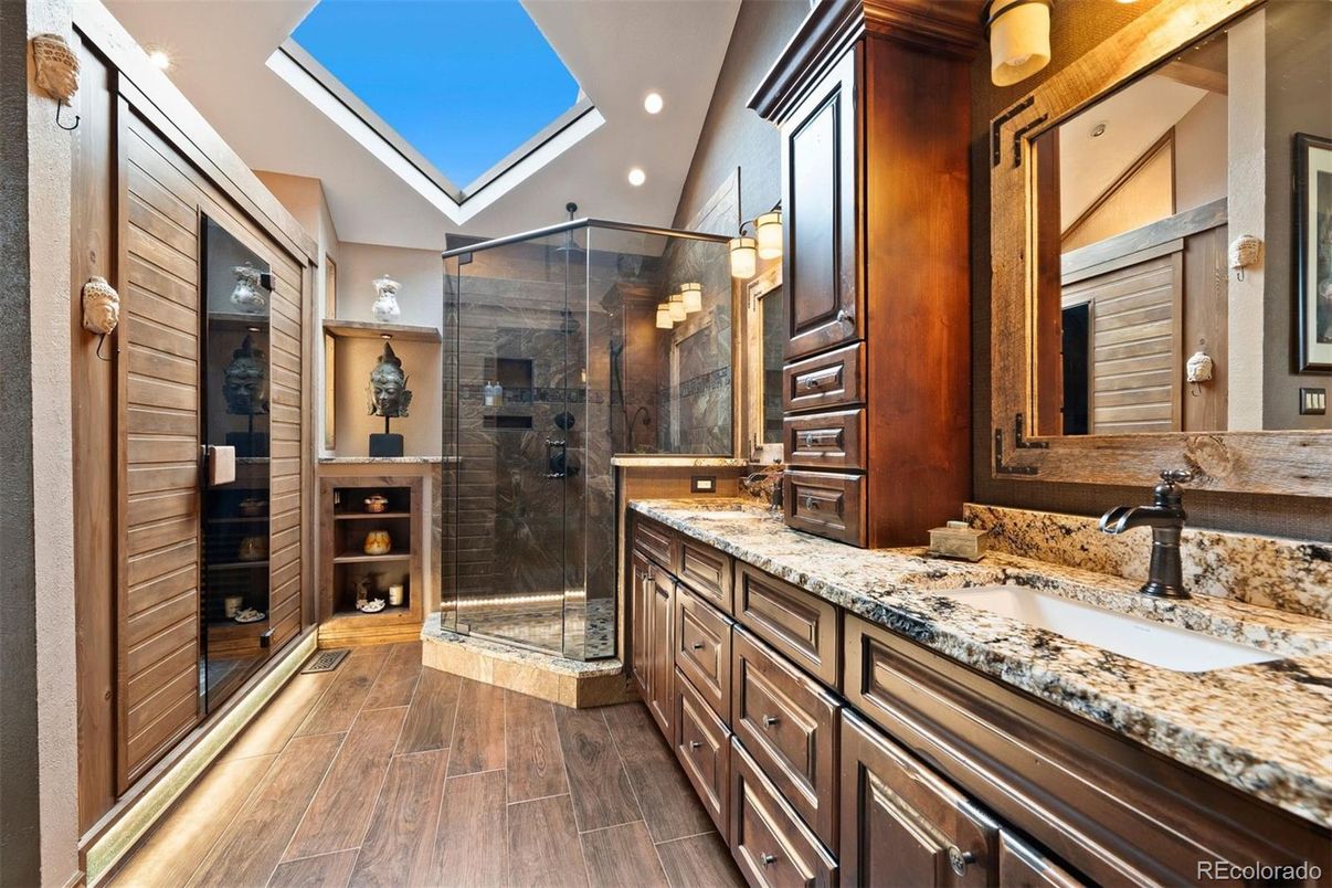 Bathroom, Dual Sink Vanities, Glass Ceilings, Glass Shower, Interior, Recessed Lighting, Wood Texture Flooring