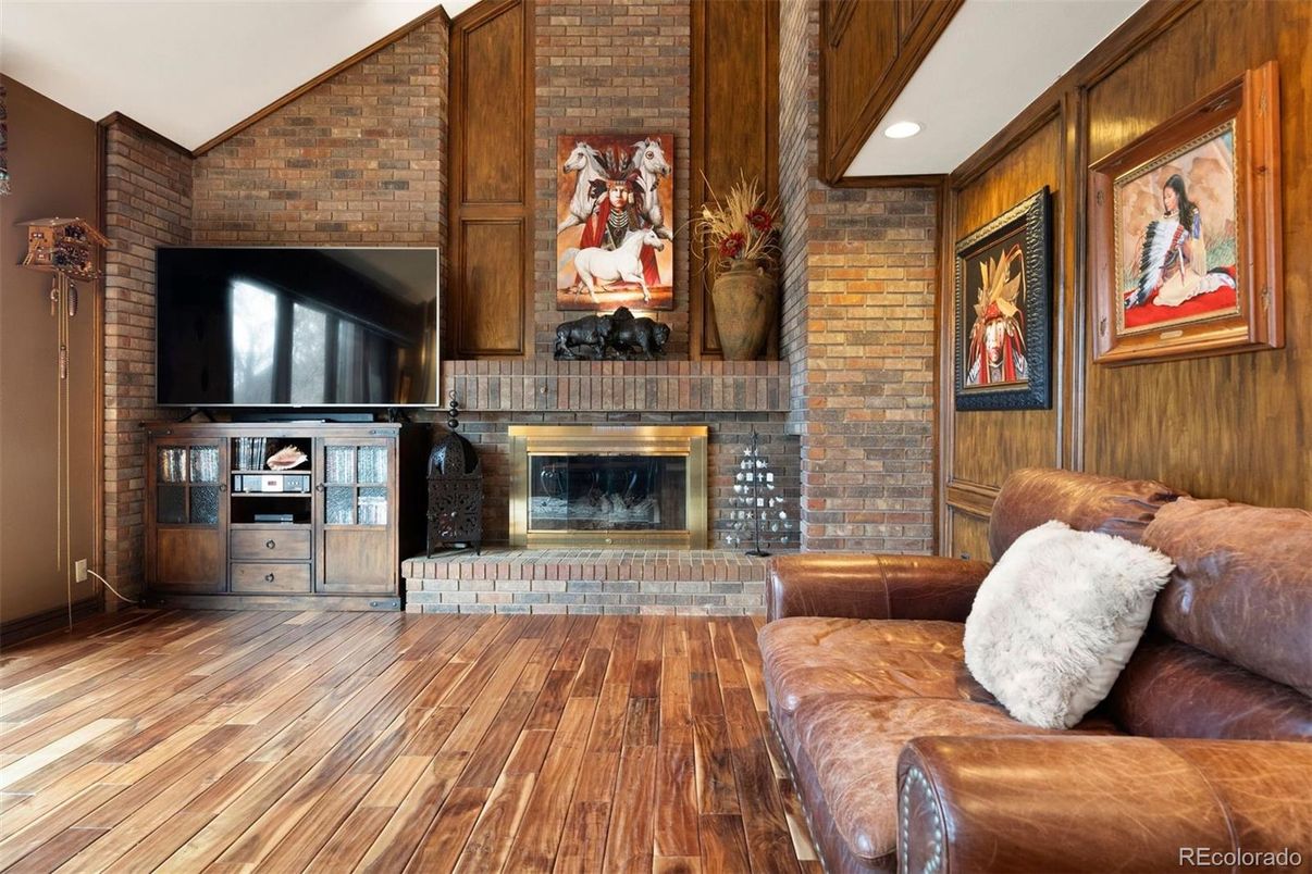 Fireplace, Interior, Living room, Recessed Lighting, Stone Walls, Wood Texture Flooring, Wooden Walls