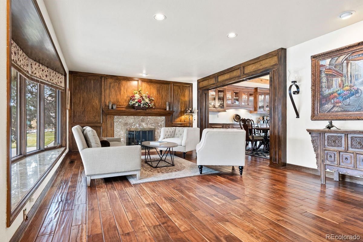 Dining room, Fireplace, Interior, Living room, Recessed Lighting, Wood Texture Flooring, Wooden Walls