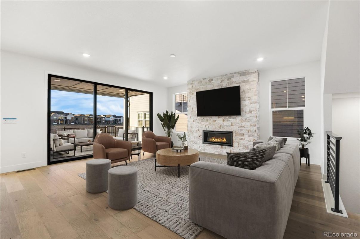 Fireplace, Interior, Living room, Recessed Lighting, Stone Walls, Wood Texture Flooring