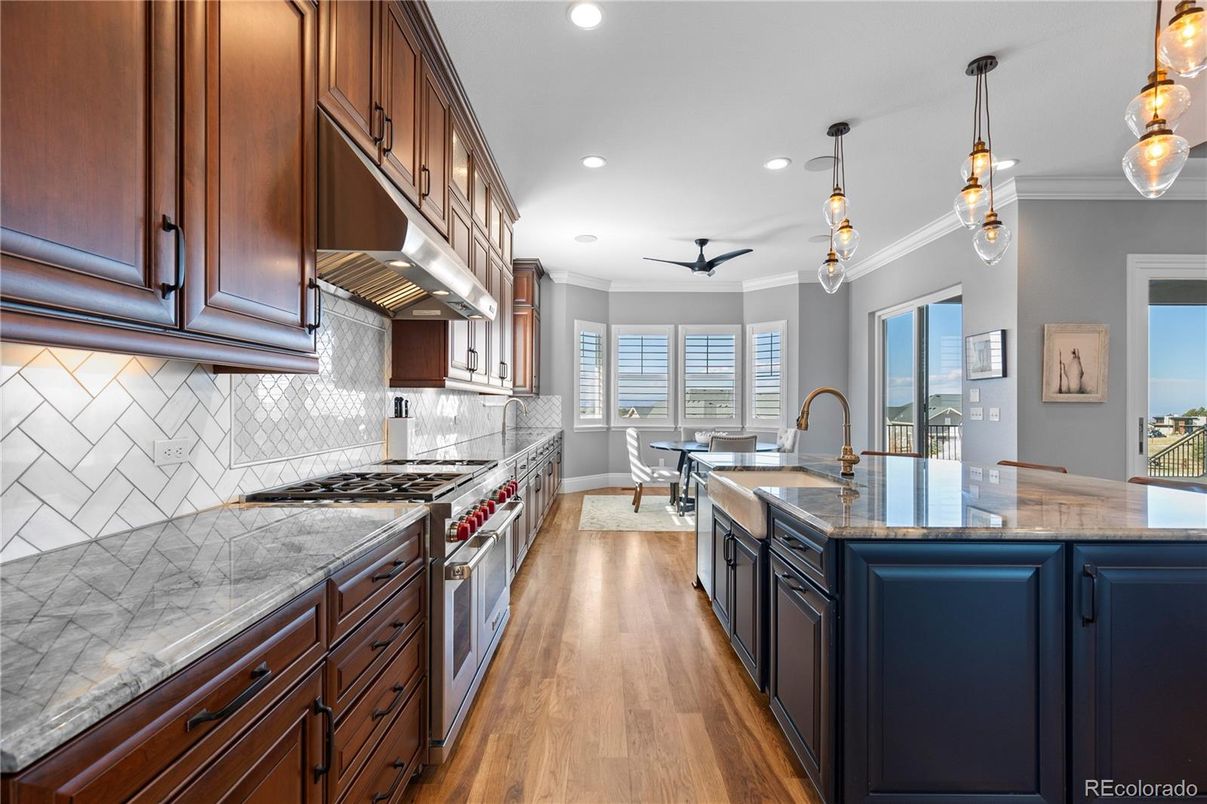 Dining room, Interior, Kitchen, Pendant Lights, Recessed Lighting, Stainless Steel Appliances, Wood Texture Flooring