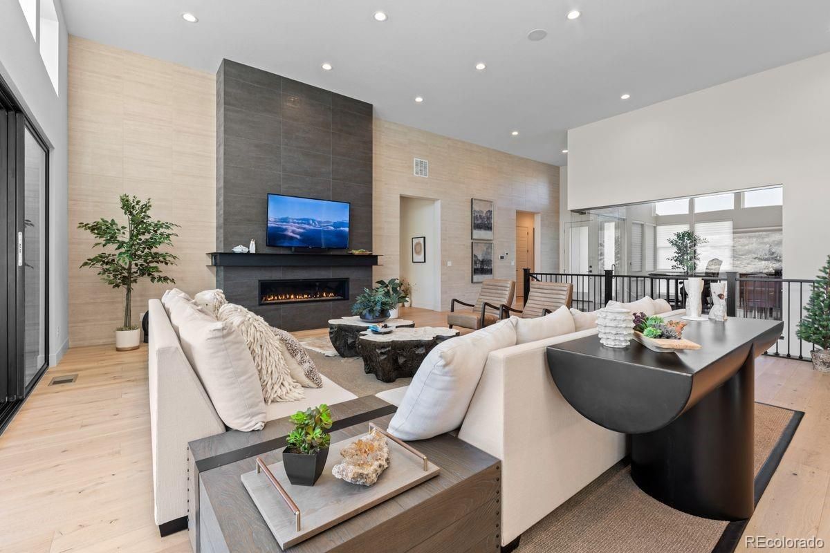 Dining room, Fireplace, Interior, Living room, Recessed Lighting, Wood Texture Flooring