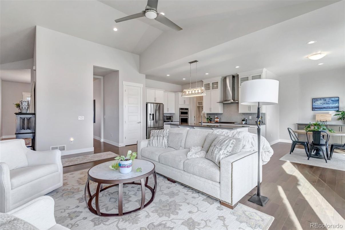 Dining room, Interior, Kitchen, Living room, Pendant Lights, Recessed Lighting, Stainless Steel Appliances, Wood Texture Flooring