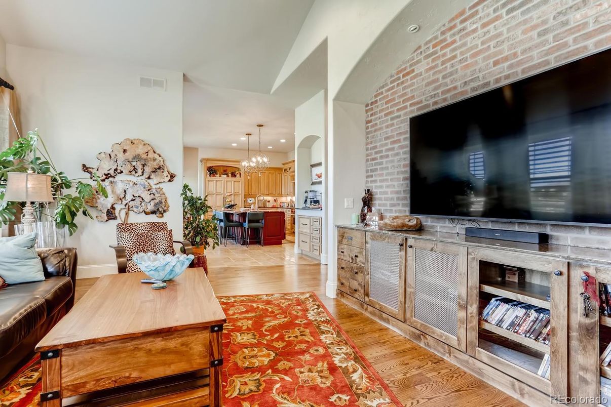 Interior, Kitchen, Pendant Lights, Recessed Lighting, Stainless Steel Appliances, Stone Walls, Wood Texture Flooring