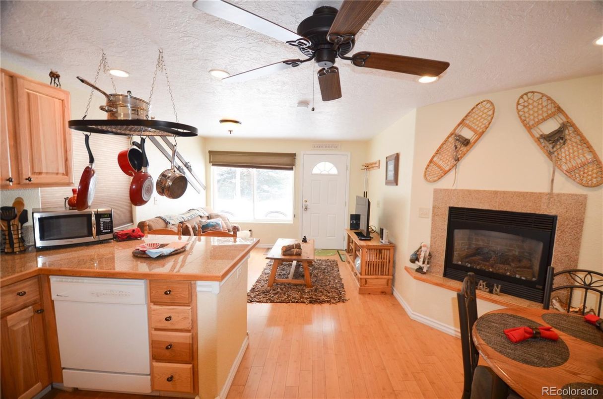 Fireplace, Interior, Kitchen, Living room, Recessed Lighting, Wood Texture Flooring