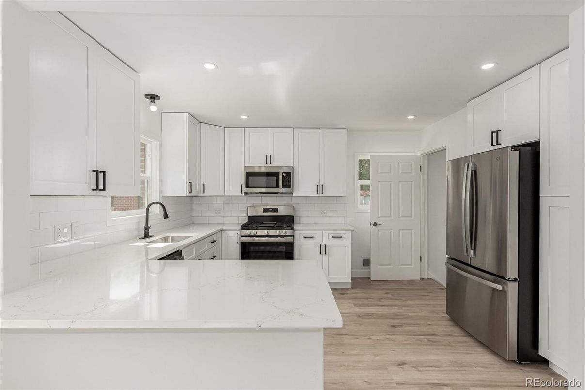 Interior, Kitchen, Recessed Lighting, Stainless Steel Appliances, Wood Texture Flooring