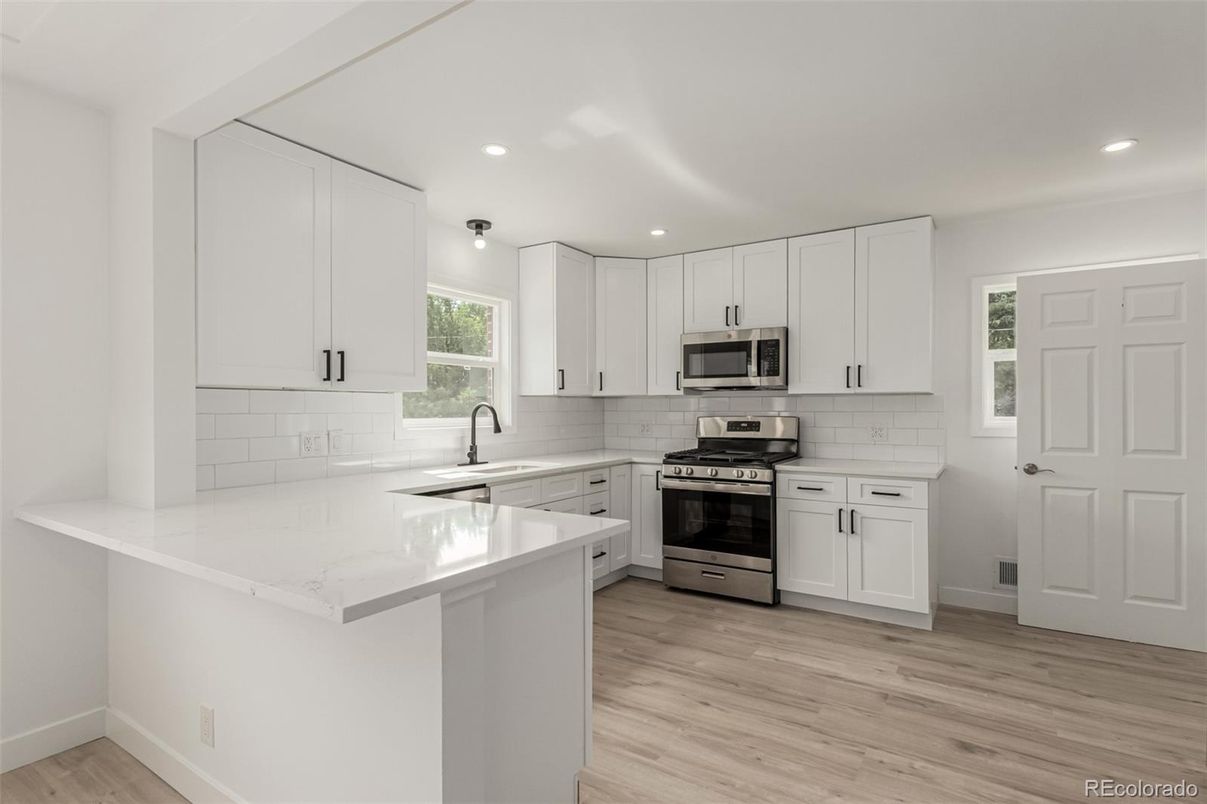 Interior, Kitchen, Recessed Lighting, Stainless Steel Appliances, Wood Texture Flooring