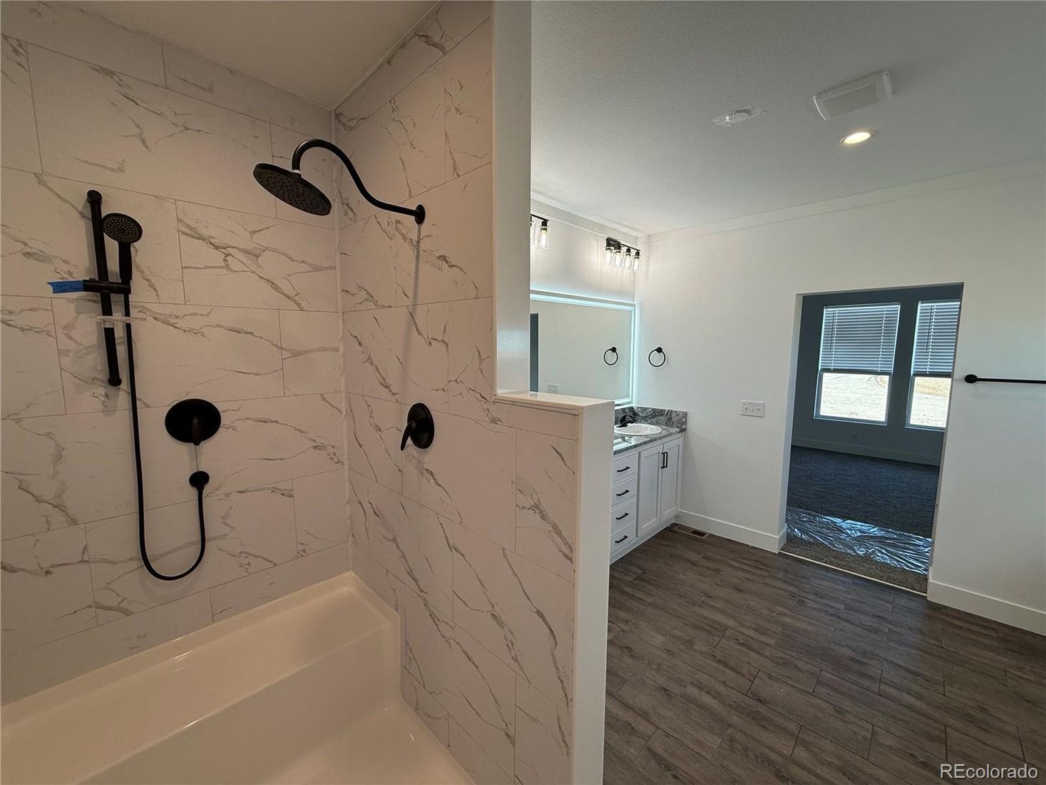 Bathroom, Interior, Marble Walls, Recessed Lighting, Wood Texture Flooring