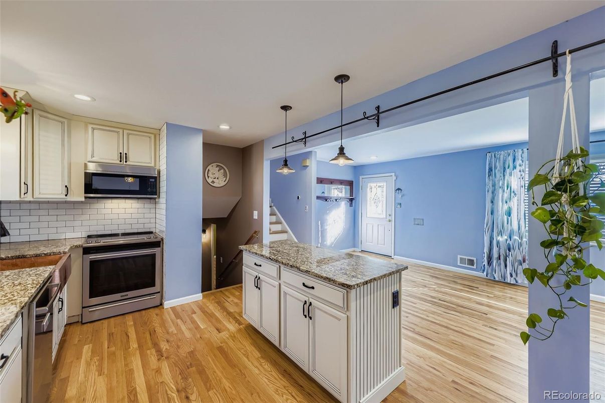 Interior, Kitchen, Pendant Lights, Recessed Lighting, Stainless Steel Appliances, Wood Texture Flooring