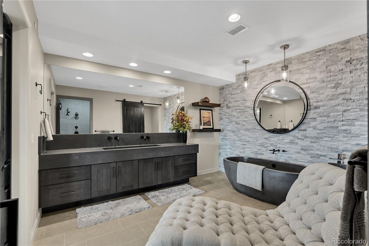 Bathroom, Dual Sink Vanities, Interior, Pendant Lights, Recessed Lighting, Stone Walls
