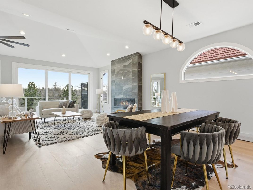 Dining room, Fireplace, Interior, Living room, Pendant Lights, Recessed Lighting, Wood Texture Flooring