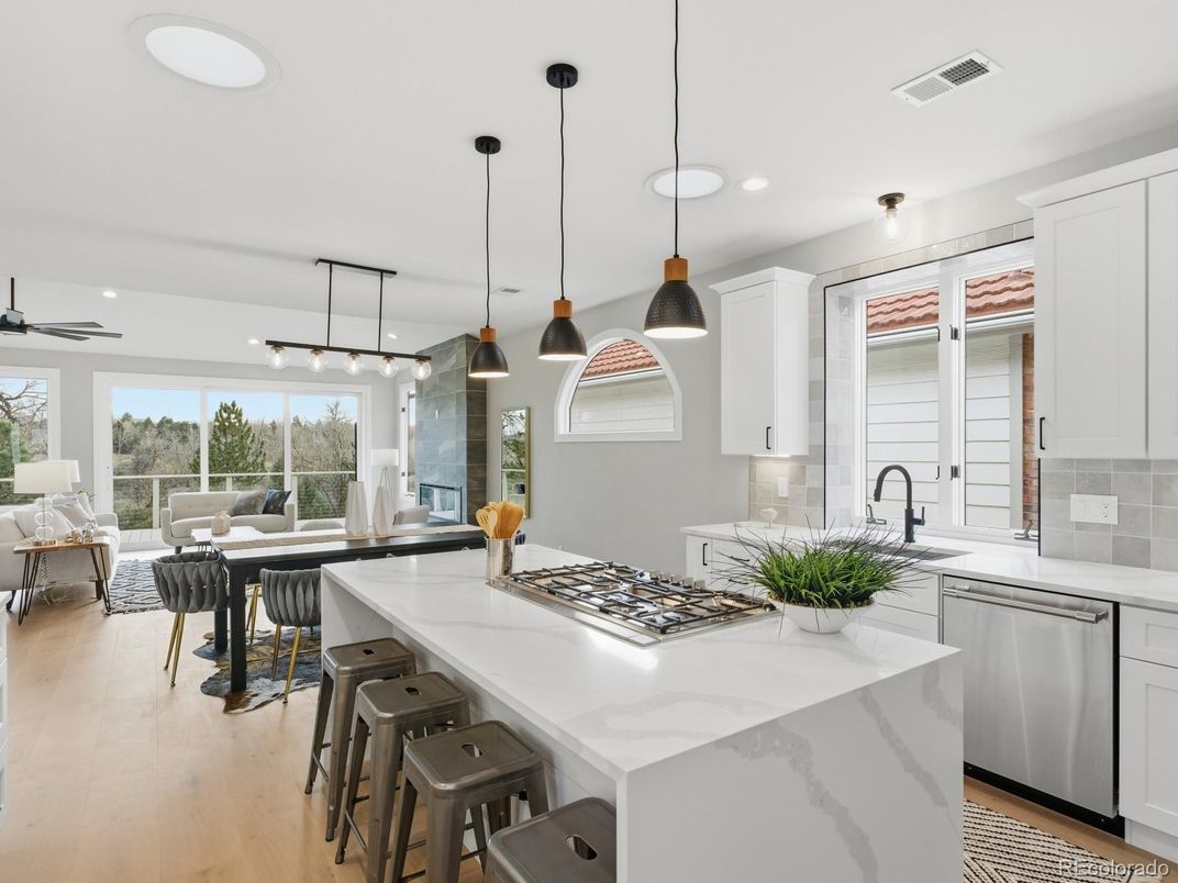 Dining room, Interior, Kitchen, Living room, Pendant Lights, Recessed Lighting, Stainless Steel Appliances, Wood Texture Flooring