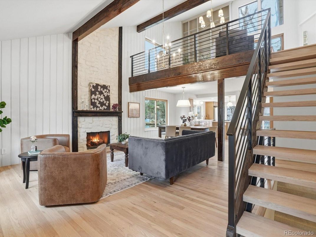 Chandelier, Fireplace, Interior, Living room, Pendant Lights, Stone Walls, Wooden Beams, Wood Texture Flooring