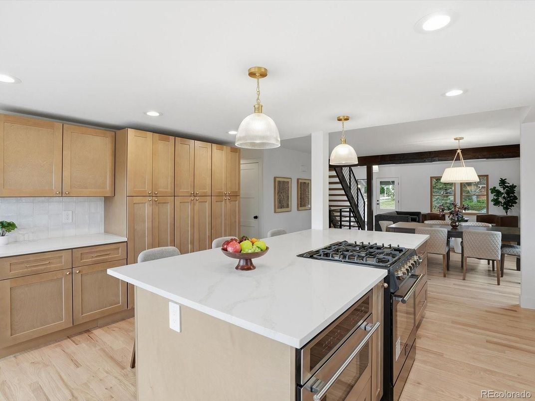 Dining room, Interior, Kitchen, Living room, Pendant Lights, Recessed Lighting, Stainless Steel Appliances, Wood Texture Flooring