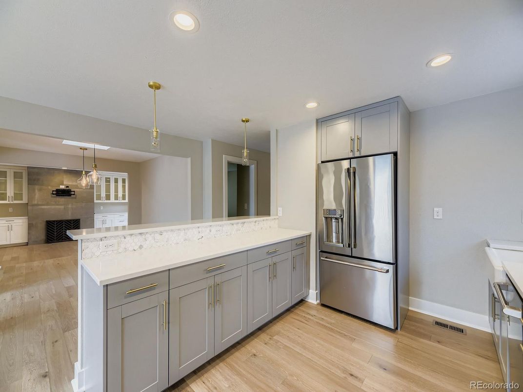 Interior, Kitchen, Pendant Lights, Recessed Lighting, Stainless Steel Appliances, Wood Texture Flooring