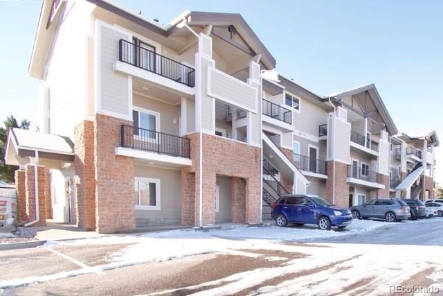 Attached, Exterior, Facade, Brick Facade, Condo Building