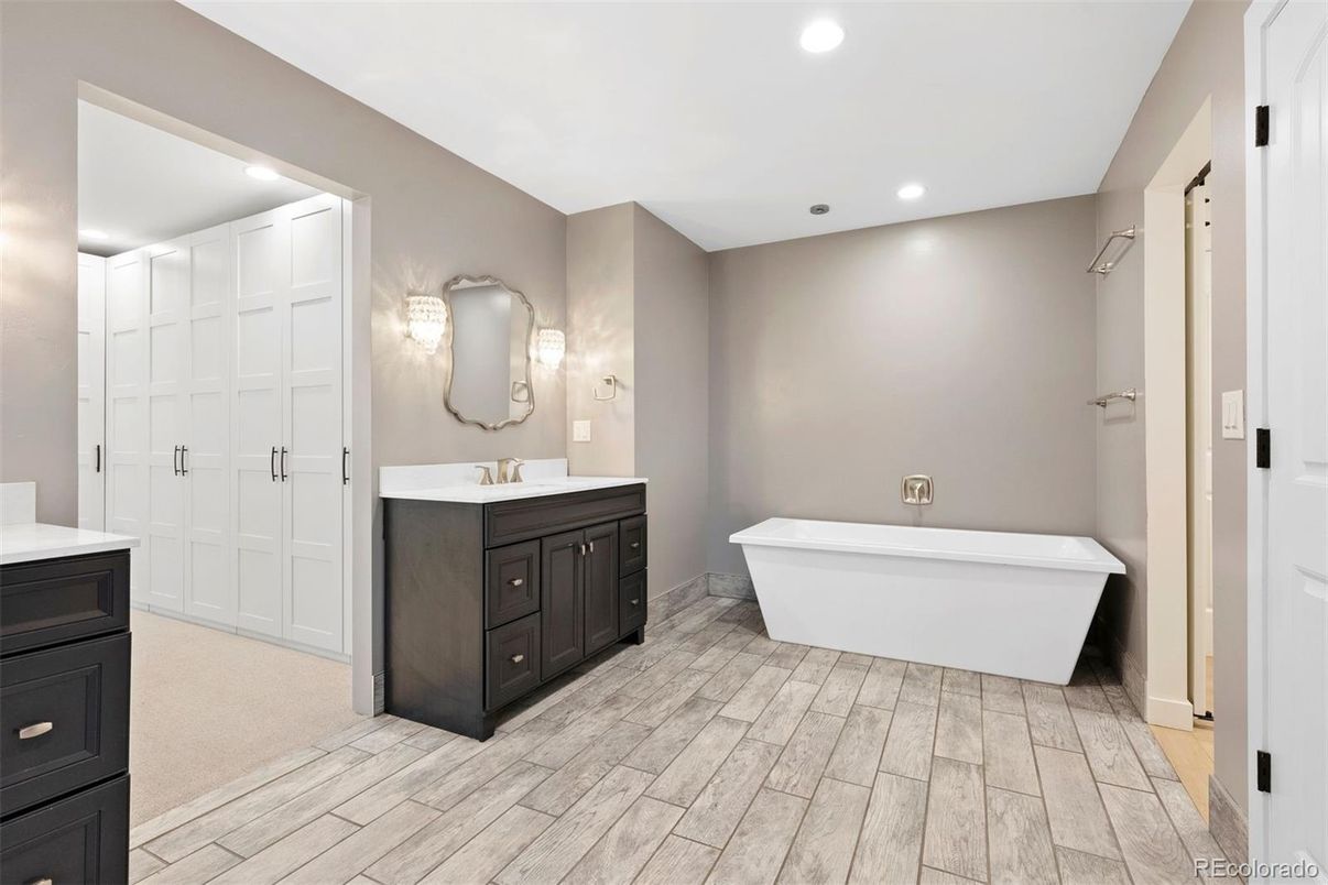 Bathroom, Dual Sink Vanities, Free Standing Baths, Interior, Recessed Lighting, Wood Texture Flooring