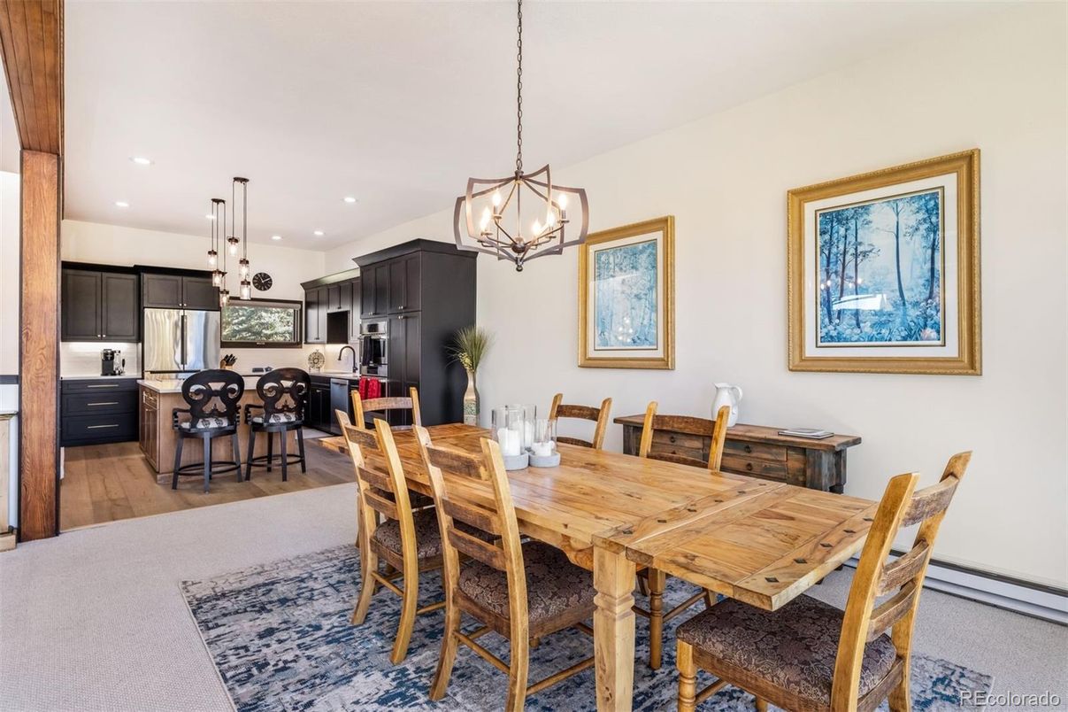 Chandelier, Dining room, Interior, Kitchen, Pendant Lights, Recessed Lighting, Stainless Steel Appliances, Wood Texture Flooring