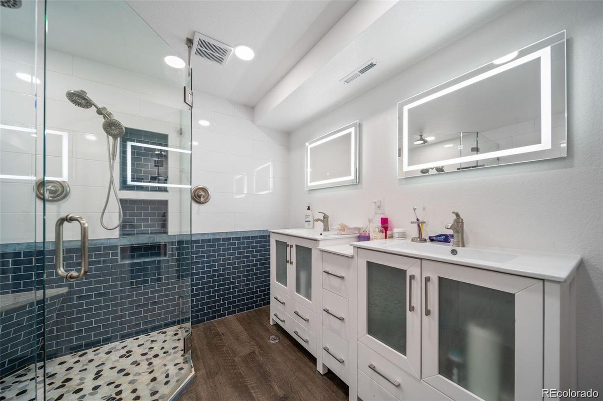 Bathroom, Dual Sink Vanities, Glass Shower, Interior, Recessed Lighting, Wood Texture Flooring