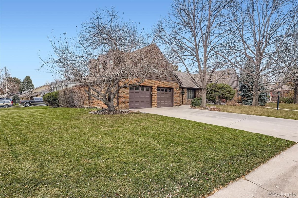 Attached, Backyard, Exterior, Facade, Brick Facade, Cape Cod