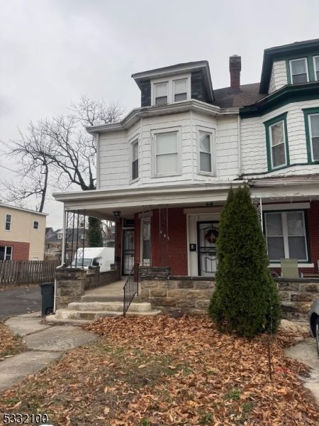 Exterior, Facade, Brick Facade, American Foursquare