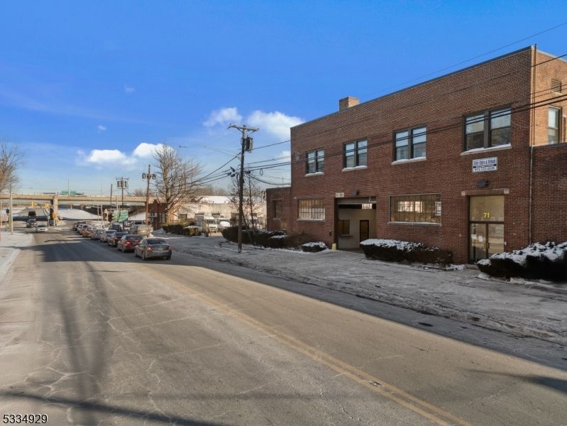 Exterior, Facade, Brick Facade, Condo Building