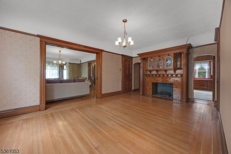 Chandelier, Empty room, Fireplace, Interior, Wood Texture Flooring