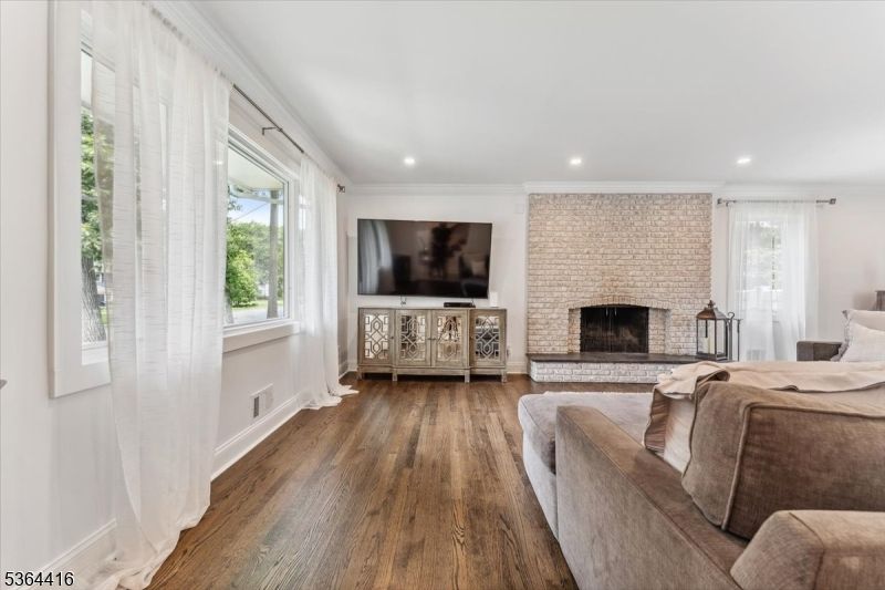 Fireplace, Interior, Living room, Recessed Lighting, Stone Walls, Wood Texture Flooring