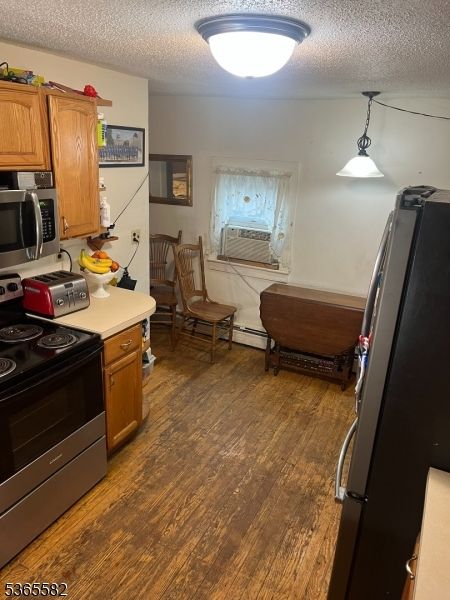 Dining room, Interior, Kitchen, Pendant Lights, Stainless Steel Appliances, Wood Texture Flooring