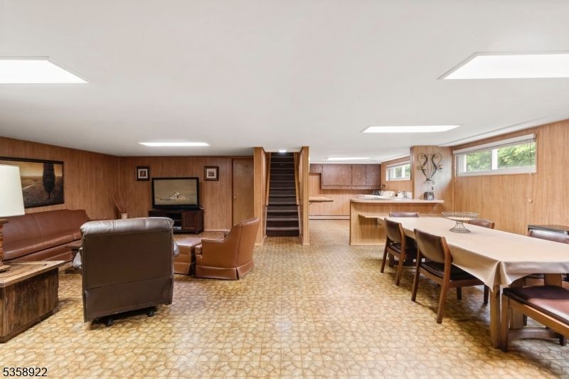 Dining room, Fireplace, Interior, Kitchen, Living room, Recessed Lighting, Wooden Walls