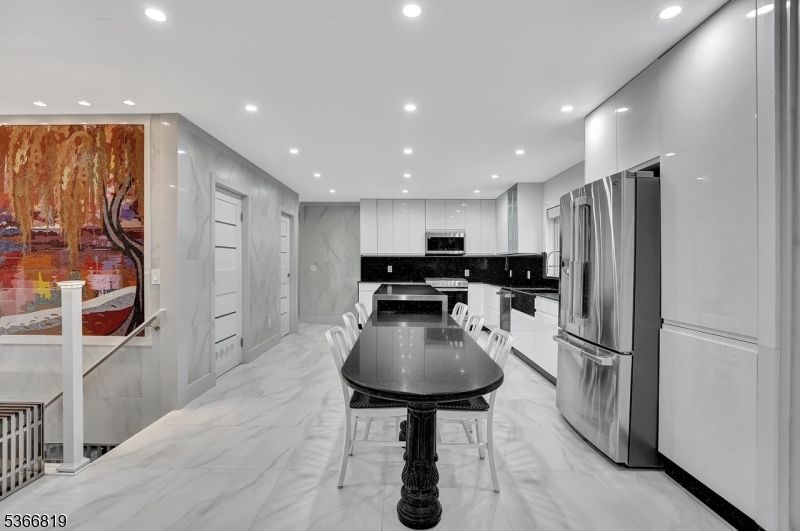 Interior, Kitchen, Marble, Marble Walls, Recessed Lighting, Stainless Steel Appliances