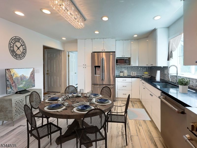 Dining room, Interior, Kitchen, Recessed Lighting, Stainless Steel Appliances, Wood Texture Flooring