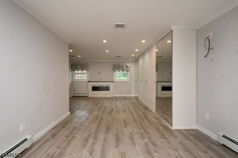 Empty room, Fireplace, Interior, Recessed Lighting, Wood Texture Flooring