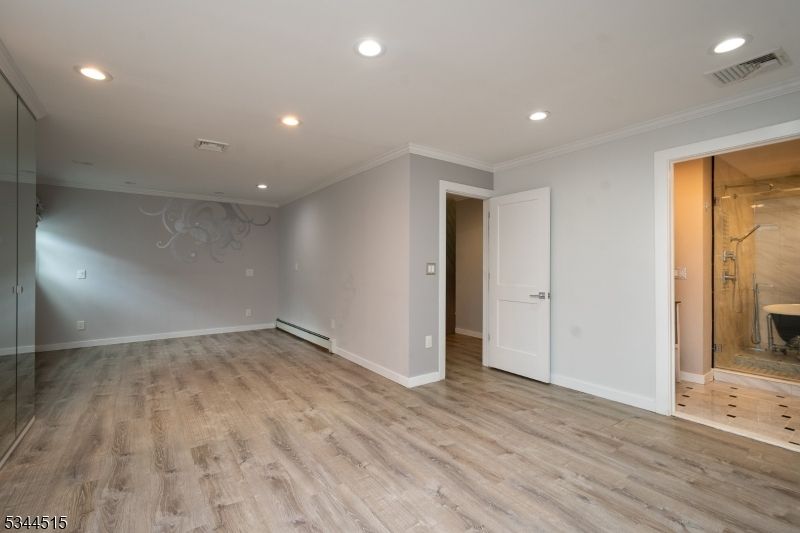 Bathroom, Empty room, Glass Shower, Interior, Recessed Lighting, Wood Texture Flooring