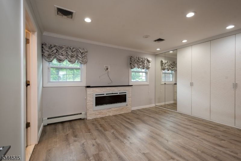 Empty room, Fireplace, Interior, Recessed Lighting, Wood Texture Flooring