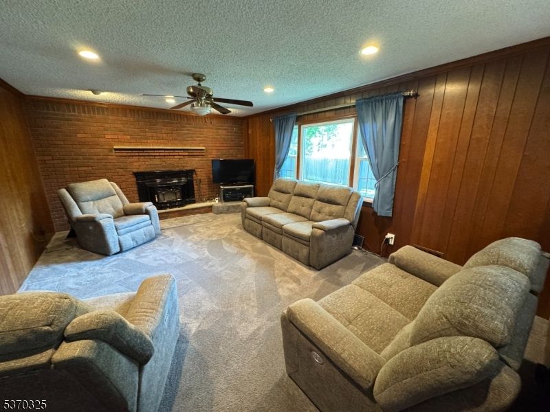 Fireplace, Interior, Living room, Recessed Lighting, Stone Walls, Wooden Walls