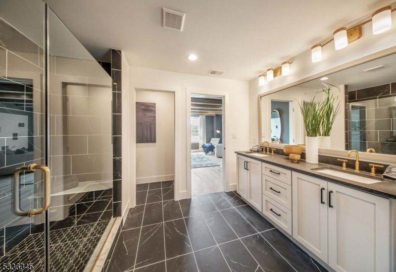 Bathroom, Dual Sink Vanities, Glass Shower, Interior, Marble, Recessed Lighting