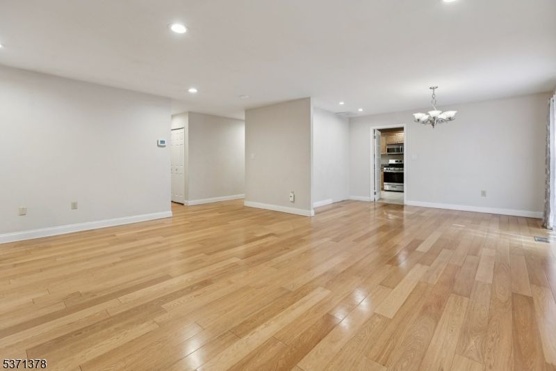 Chandelier, Empty room, Interior, Recessed Lighting, Wood Texture Flooring