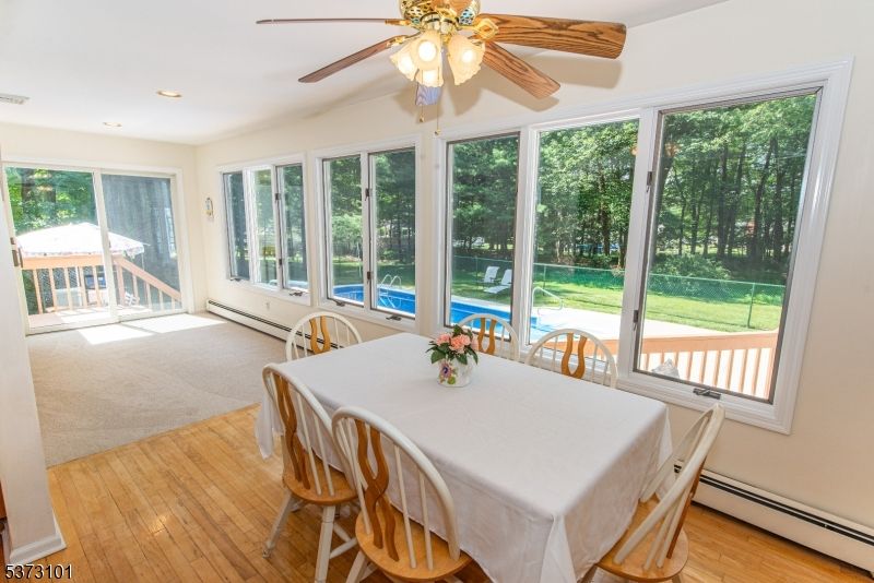 Dining room, Interior, Recessed Lighting, Sun Room, Wood Texture Flooring
