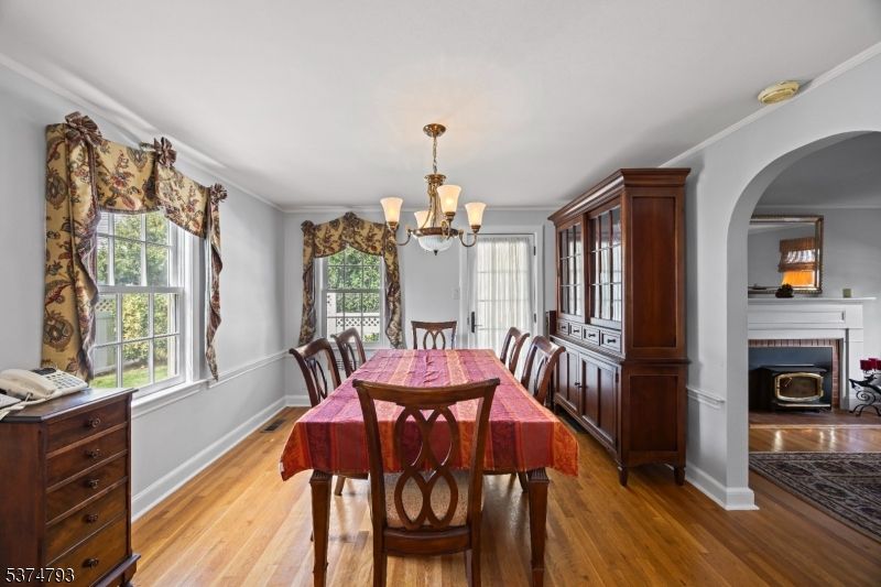 Chandelier, Dining room, Fireplace, Interior, Wood Texture Flooring