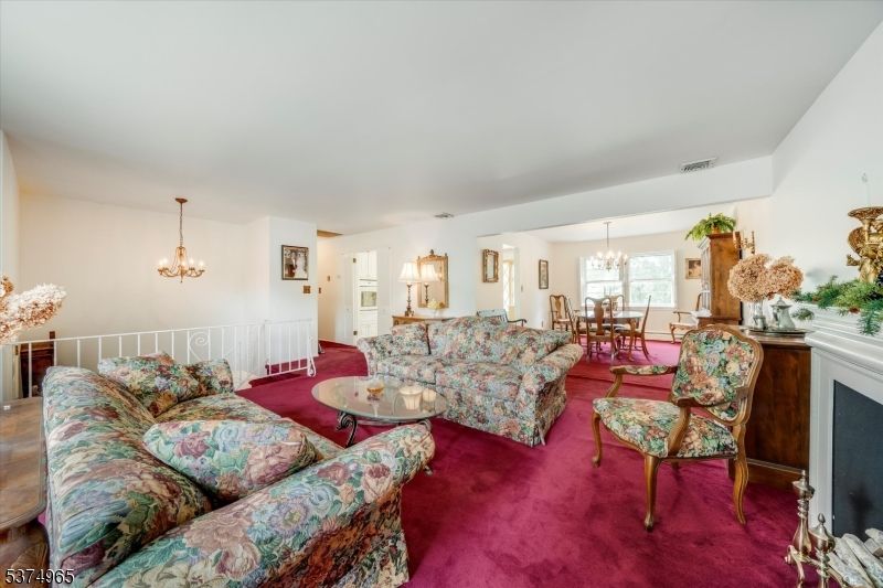 Chandelier, Dining room, Fireplace, Interior, Living room