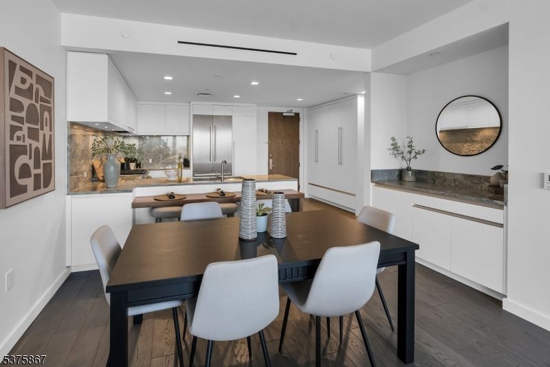 Dining room, Interior, Kitchen, Recessed Lighting, Stainless Steel Appliances, Wood Texture Flooring