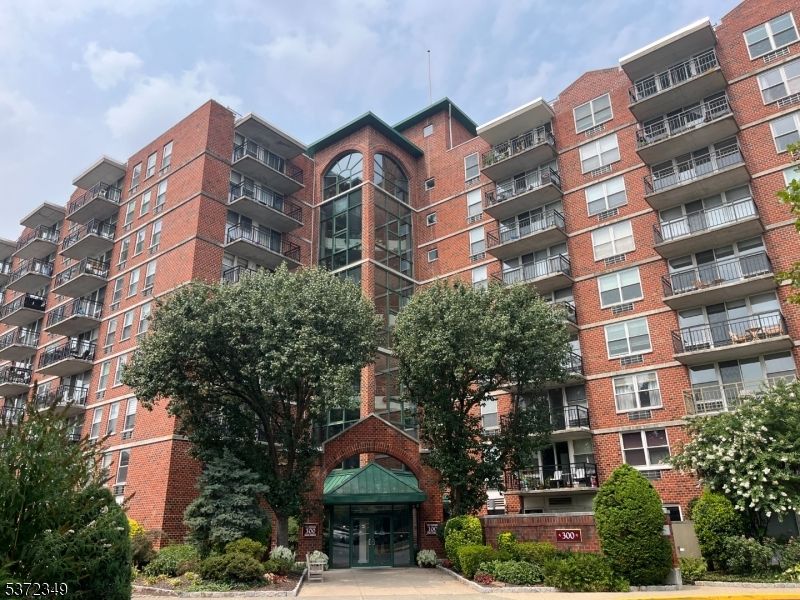 Exterior, Facade, Brick Facade, Condo Building